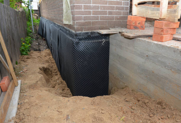 SJ Waterproofing Pros technician performing targeted Waterproofing assessment in Highland, OH